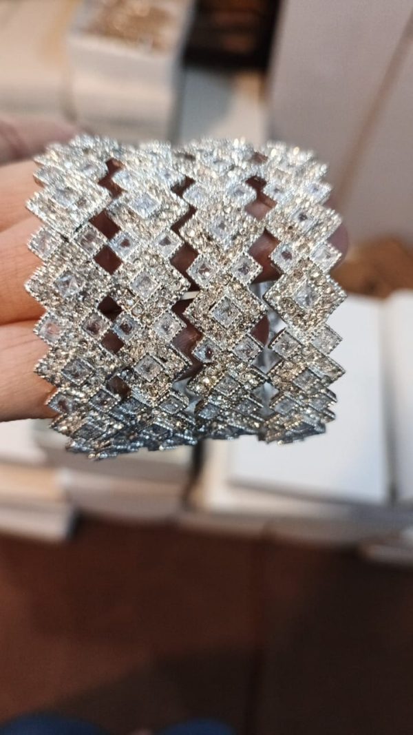 STERLING SILVER DESIGNER ITALIAN MADE TENNIS BANGLE 4 CREATED STONES