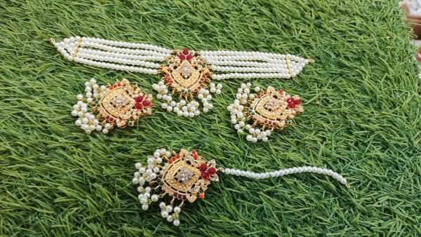 Nauratan choker with Earings and Tika Elegant design, perfect for any occasion